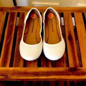 NWT Lucky Brand flats. White with lace up stitching on the back seam.